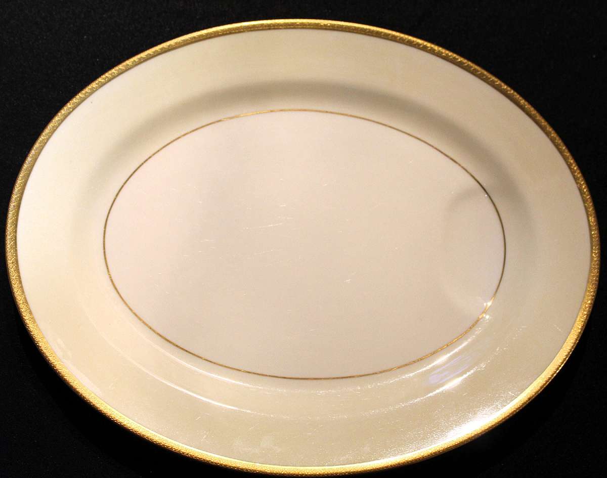 Up for sale is this Theodore Haviland Milford Fourteen Inch Platter in great condition with no chips or cracks. Circa 1951. Measures approx. 14 1/8"L by 11"W. Some utensil marks from use. Please see my other sales for more of this pattern. Ship