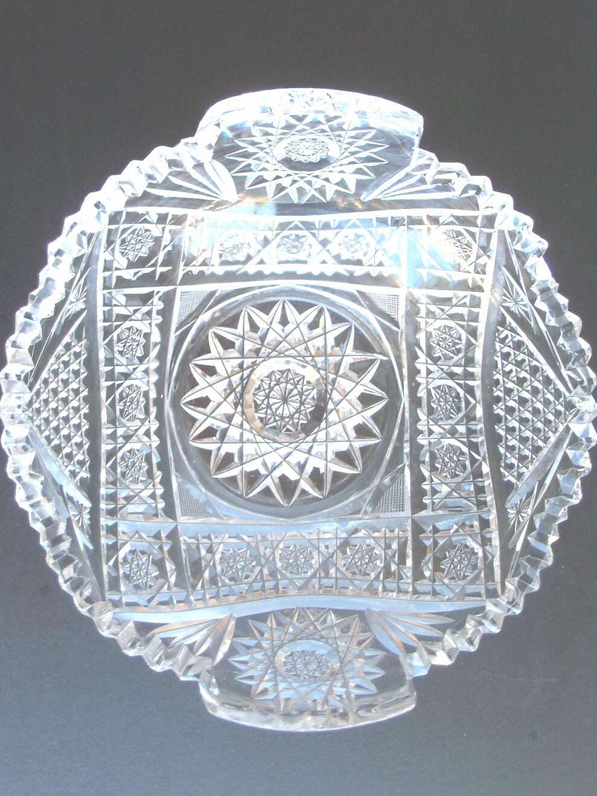 Up for sale is this Beautiful Vintage Saw Tooth Rim Heavily Decorated Handled Bowl. Measures approx. 7" wide by 3 3/8"T. This does have a small flea bite on the saw tooth rim I noticed using a magnifying glass & a couple on one handled rim.