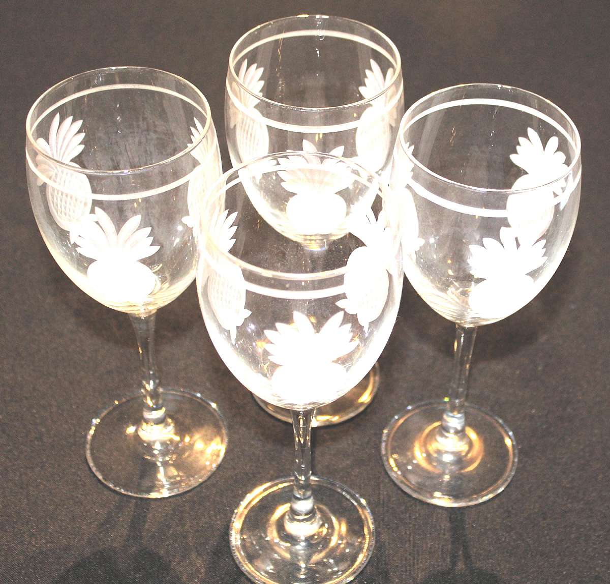 Up for sale are these Rolf Glass Pineapple Set Of Four White Wine Glasses in excellent condition with no chips or cracks. The glasses measure approx. 7 3/4"Tall by 2 7/8"W.Shipping Excludes: Alaska/Hawaii, US Protectorates, APO/FPO, PO BoxShip