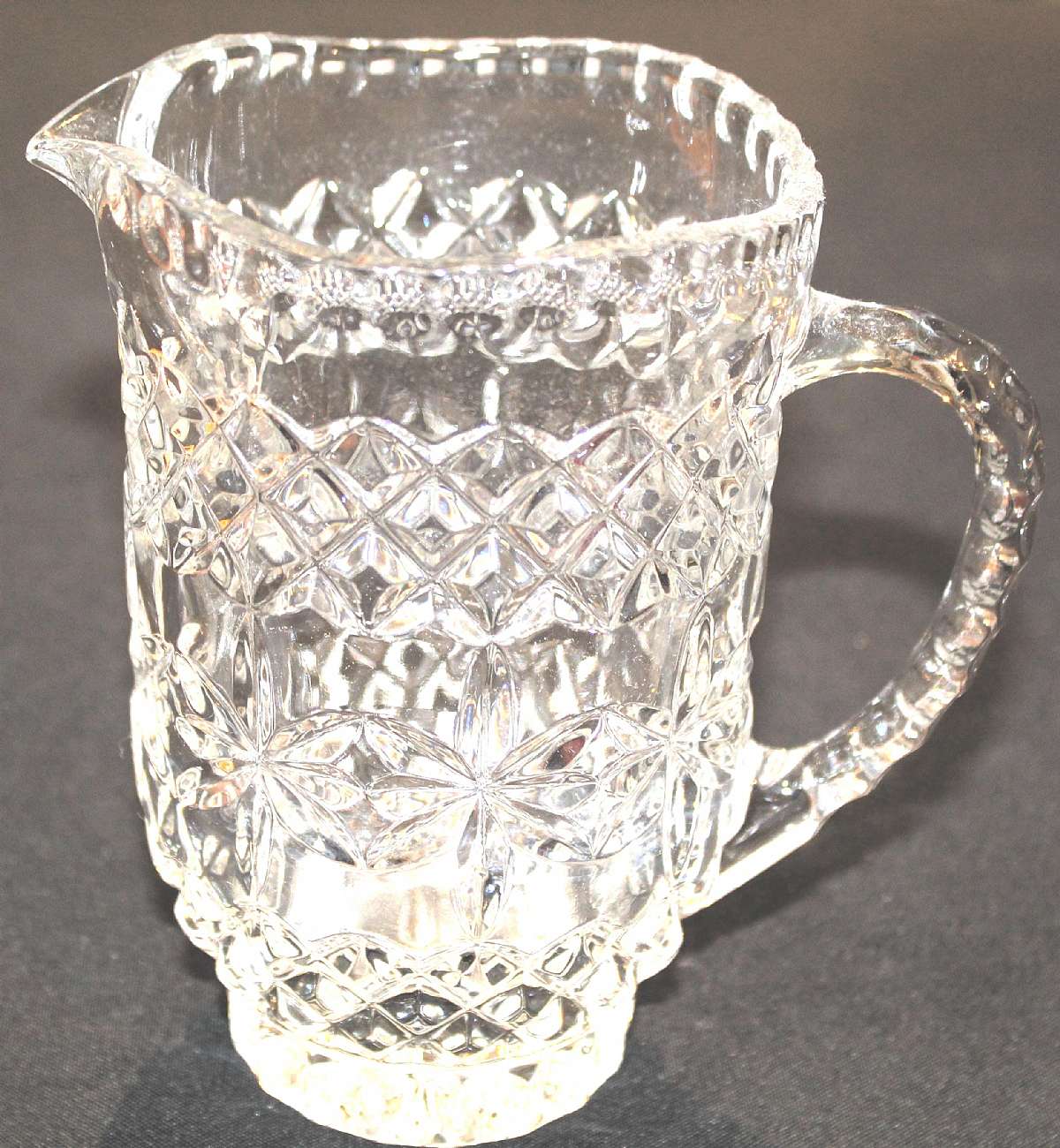 Up for sale is this Beautiful Vintage Crystal D'Adriana 24 Ounce Pitcher in excellent condition with no chips or cracks. Measures approx. 6 1/2 inches Tall.Shipping Excludes: Alaska/Hawaii, US Protectorates, APO/FPO, PO BoxShipping Provided to the Unite
