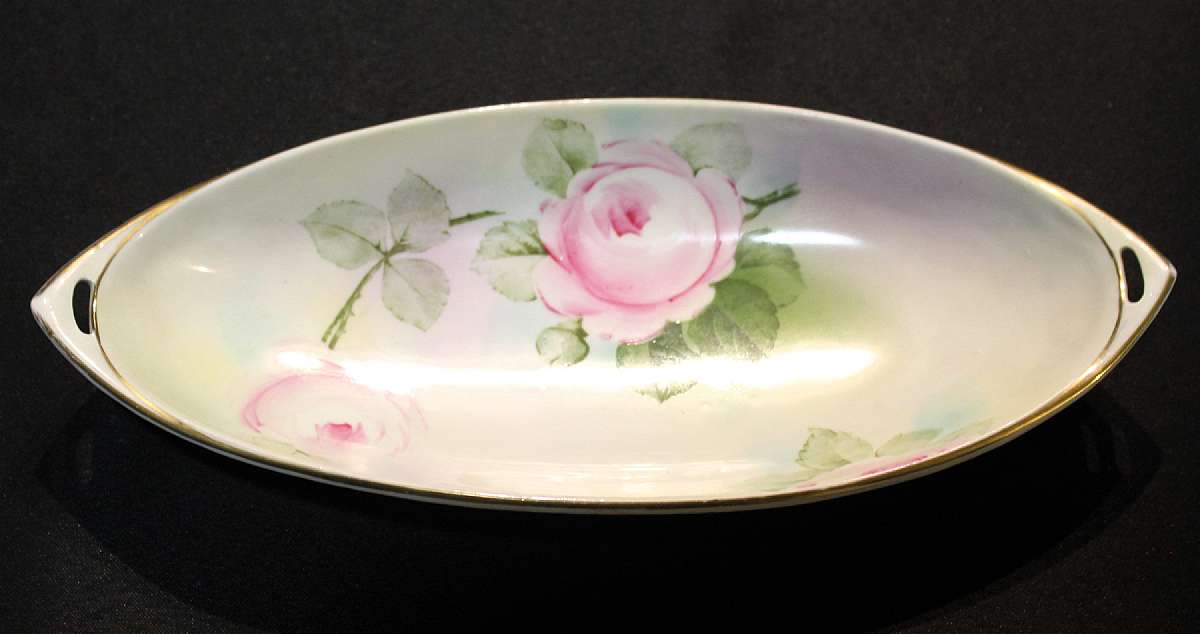 Up for sale is this Rudolstadt Thuringia Prussia Studio Hand Painted Antique Celery Dish in great condition with no chips or cracks. It measures approx. 12 3/4"L by 5 1/2"W.  Shipping Excludes: Alaska/Hawaii, US Protectorates, APO/FPO, PO BoxS