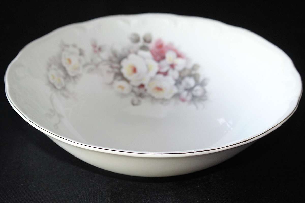 Up for sale is this Schmidt Porcelain White Rose Serving Bowl in excellent condition with no chips or cracks. The silver rim probably platinum is excellent as well. The bowl measures approx. 9 1/2"W by 2 5/8"D. Shipping Excludes: Alaska/Hawaii,