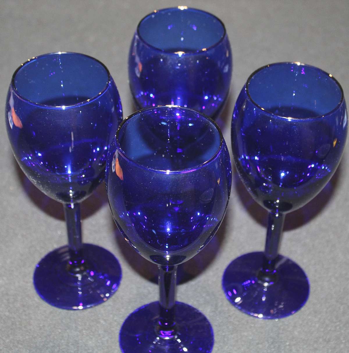 Up for sale are these Pottery Barn Cobalt Blue Set Of Four Glasses. They measure approx. 8"T by 2 1/2"W. In excellent condition with no chips or cracks. Shipping Excludes: Alaska/Hawaii, US Protectorates, APO/FPO, PO BoxShipping Provided to th