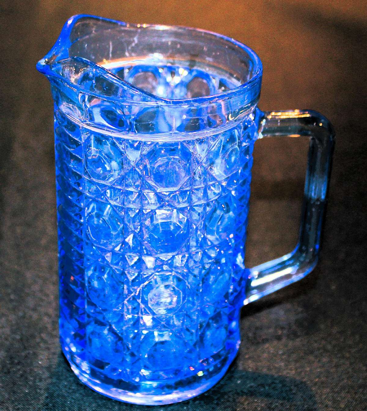 Up for sale is this Beautiful Federal Glass Windsor Blue Pint Pitcher in very good condition with no chips or cracks and slight wear. Measures approx. 5 1/2"T by 3 1/4"W.Shipping Excludes: Alaska/Hawaii, US Protectorates, APO/FPO, PO BoxShippi