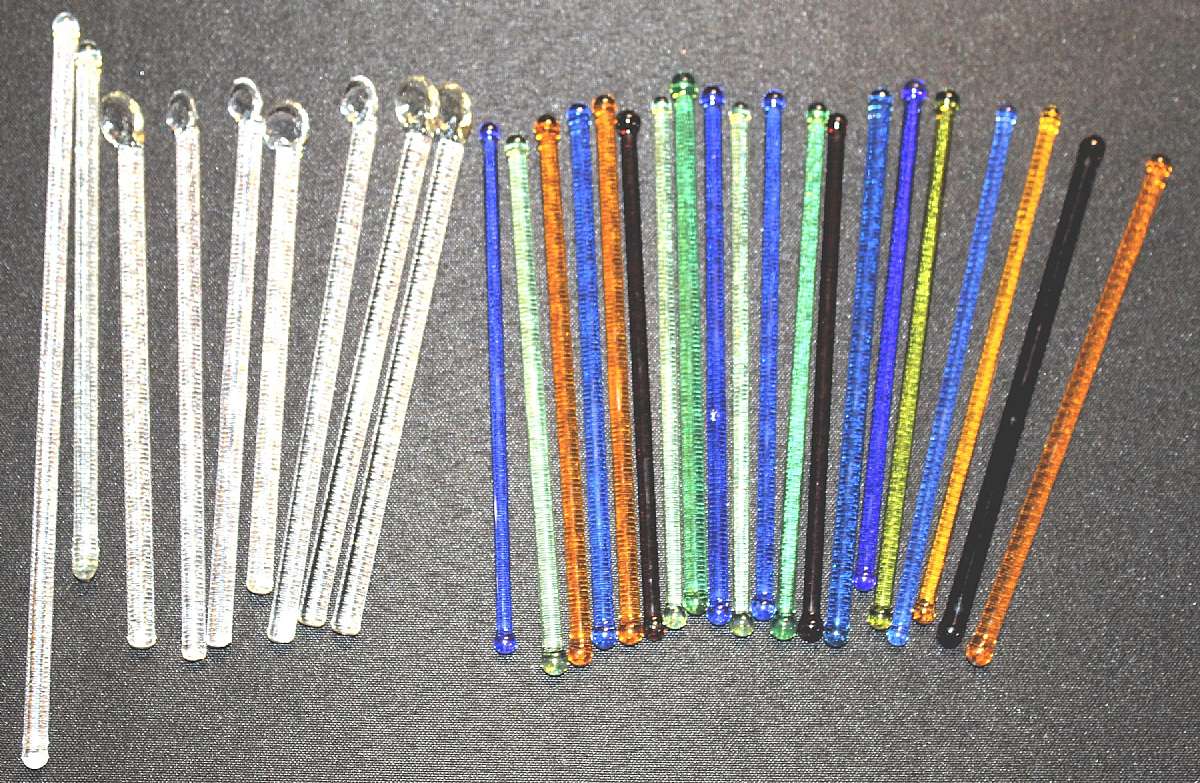 Up for sale are these Vintage Set Of 29 Glass Swizzle Sticks In great condition with no chips or cracks. The colored ones measure approx. 5 3/4 inches tall, the glass swizzle sticks about 6"T and one is 5 3/4"T and one is 8"T. Shipping Exc