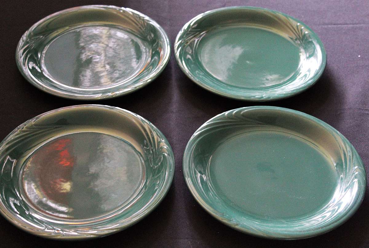 Up for sale are these Rare Sango Chromatic Hunter Green Set Of Four Dinner Plates in excellent condition. No chips or cracks. The plates measure approx. 10 3/4". Two of the plates have minor glaze imperfections on the reverse pictured.  Please see my
