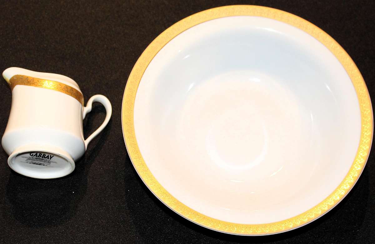 Up for sale is this Gabbay Queen Victoria Round Vegetable Bowl and creamer  in great condition with no chips or cracks. The Bowl measures approx. 9 1/8 inches wide by about 2 1/4"Deep.  Shipping Excludes: Alaska/Hawaii, US Protectorates, APO/FPO, PO