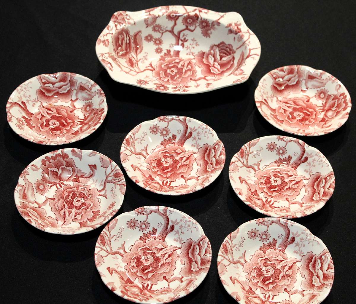Up for sale are these Johnson Bros English Chippendale Set Of 7 Fruit Bowls & One Serving Bowl in Good condition with no chips. There is some crazing. The fruit bowls measure approx. 5 1/4"W and the serving bowl is 9"L by 7 1/8"W.  Shi