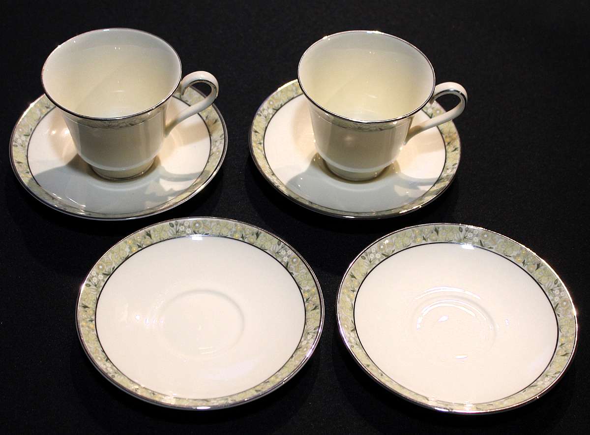 Up for sale are these Minton Wimbledon Bone China Set Of Four Saucers & Two Cups in excellent condition with no chips or cracks. The Cups measure approx. 3"T and the saucers are 5 3/4"W. Please see my other sale for this pattern.Shipping Ex