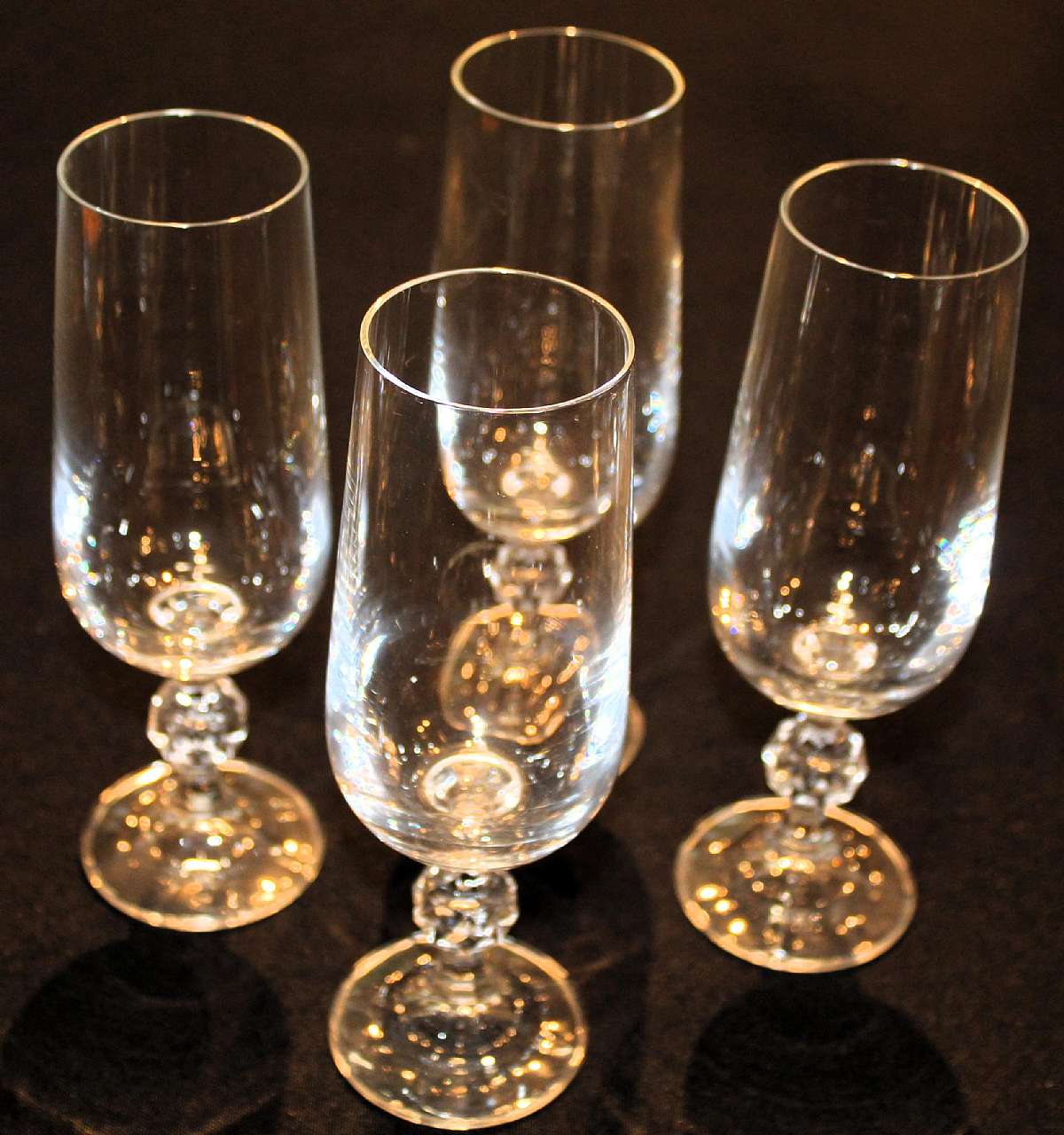 Up for sale are these Claudia By Import Associates Set Of 4 Fluted Champagne Glasses in excellent condition with no chips or cracks. They measure approx. 6 3/4" Tall by 1 3/4"W.Shipping Excludes: Alaska/Hawaii, US Protectorates, APO/FPO, PO Box
