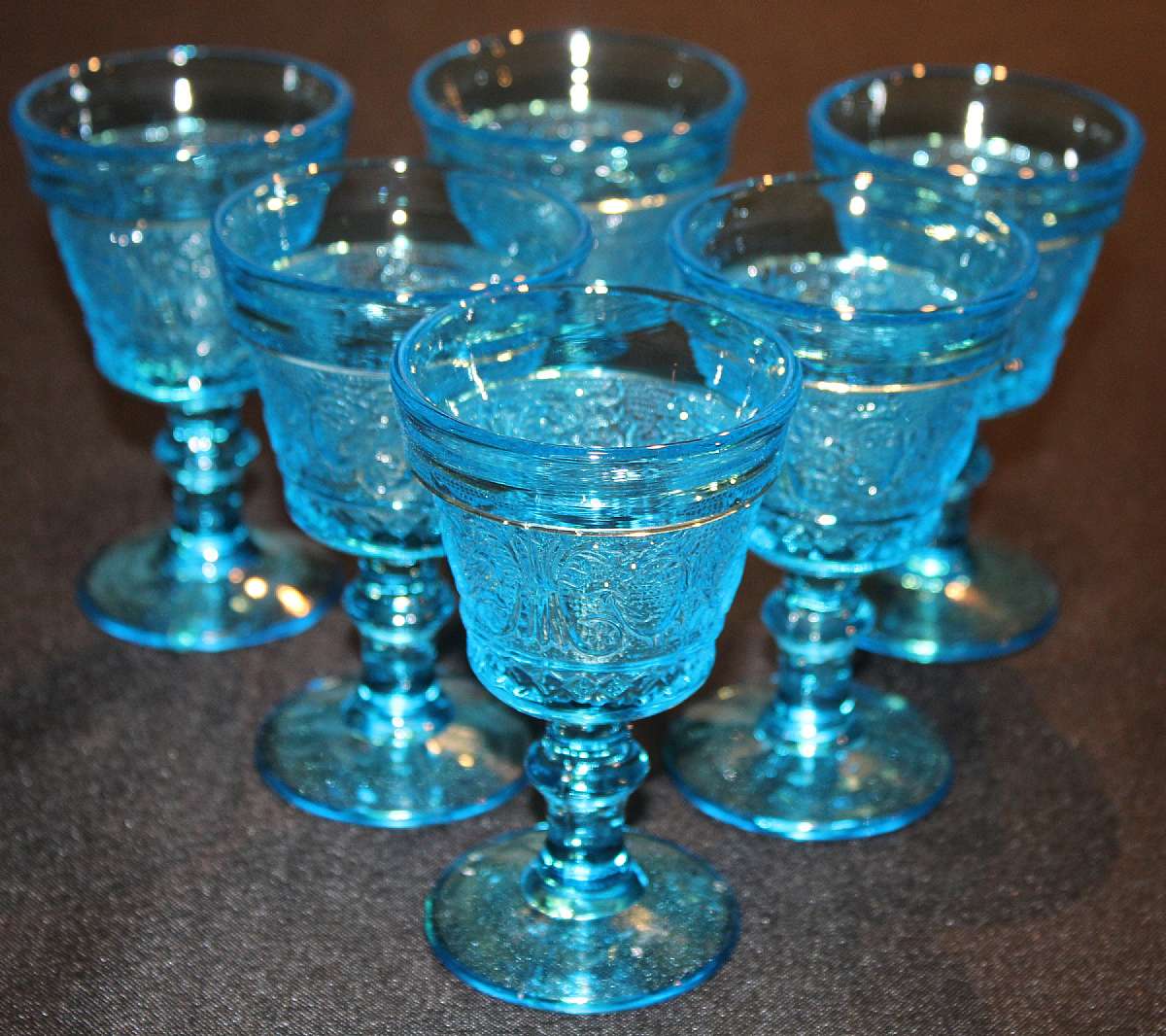 Up for sale are these Six Colony Blue Sandwich Pattern Juice Glasses in excellent condition with no chips or cracks. The glasses measure approx. 4 3/8"T by 2 5/8"W.  Shipping Excludes: Alaska/Hawaii, US Protectorates, APO/FPO, PO BoxShipping P