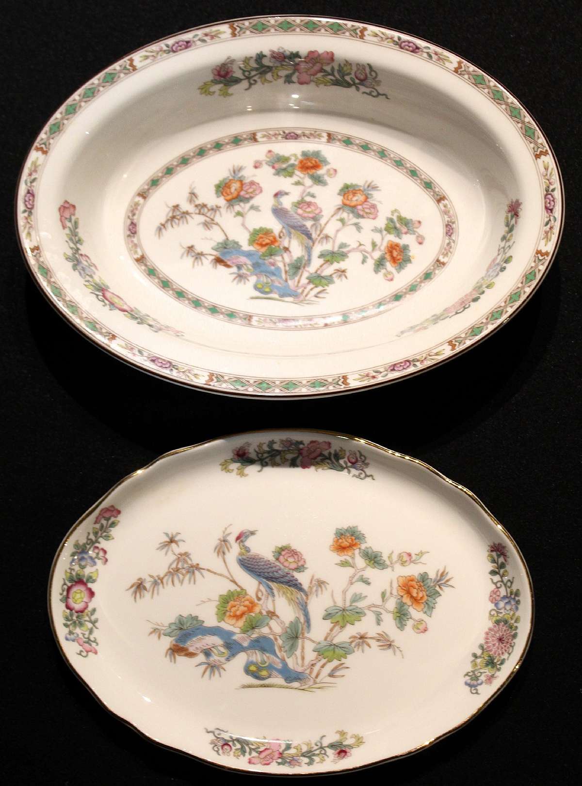 Up for sale are These Wedgwood Kutani Crane Serving Bowl & Utility Tray in excellent condition with no chips or cracks. The bowl measures approx. 10 3/4"L by 8"W. The utility Tray is 9 3/8"L by 6 3/4"W. Shipping Excludes: Alaska/H