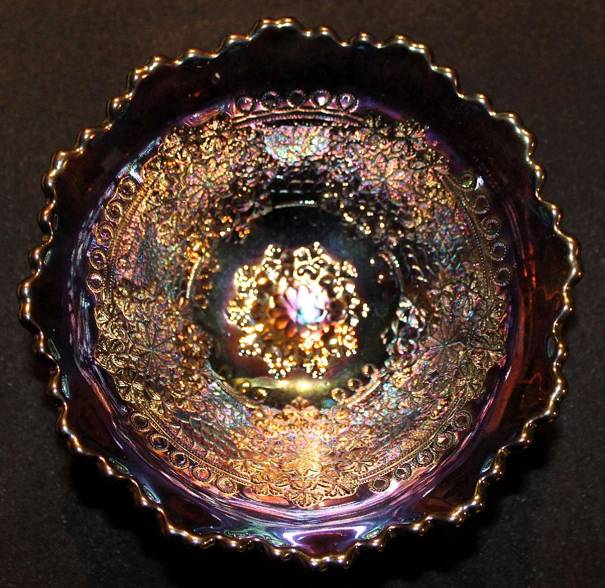 Up for sale is this Fenton Antique Carnival Glass Tri-Footed Bowl in excellent condition with no cracks or chips. The bowl measures approx. 6 3/4"W by 3 1/4"T.Shipping Excludes: Alaska/Hawaii, US Protectorates, APO/FPO, PO BoxShipping Provided