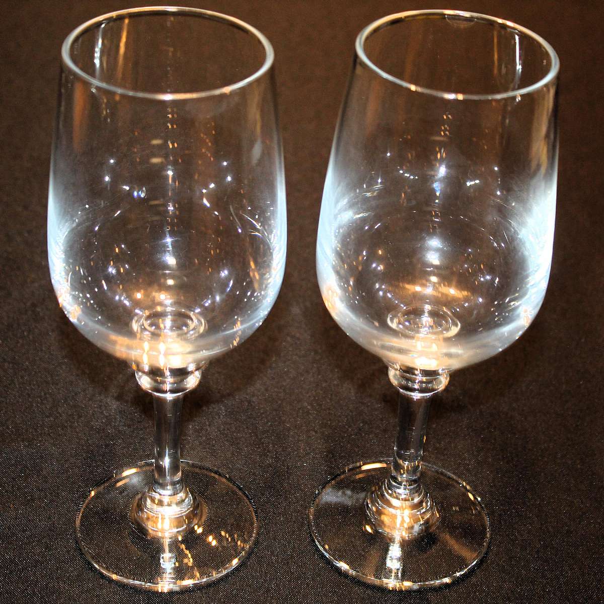 Up for sale are these Pottery Barn Claro Set Of Two Water Goblets in great condition with no chips or cracks. They measure approx. 9"T by 3"W. Shipping Excludes: Alaska/Hawaii, US Protectorates, APO/FPO, PO BoxShipping Provided to the United