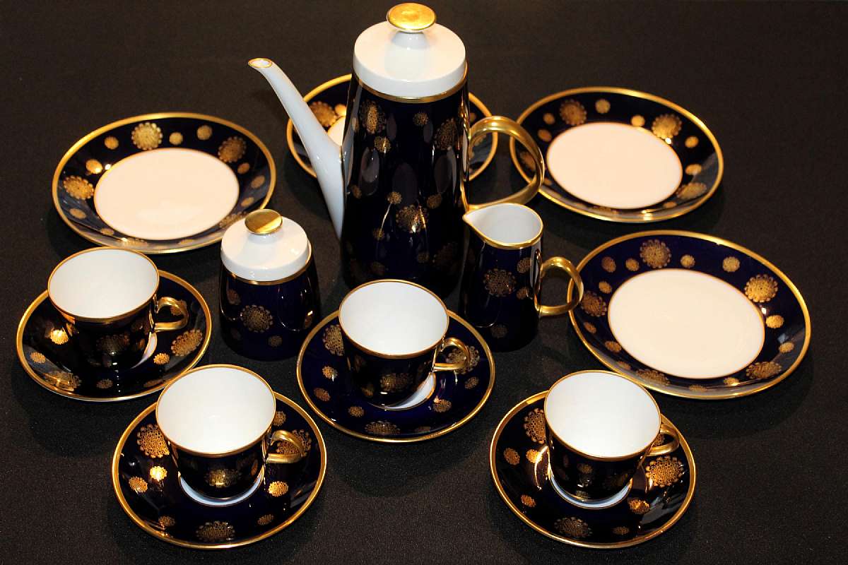 Up for sale is this Lichte Echt Kobalt GDR Seventeen Piece Coffee Set in excellent condition with no chips or cracks. There are Four 7 5/8" Plates, Four 2 3/4"T by 3 1/8"W, Four 5 3/4" Saucers, One Sugar Bowl, One Sugar Bowl Lid, One Creamer, One Coffee P