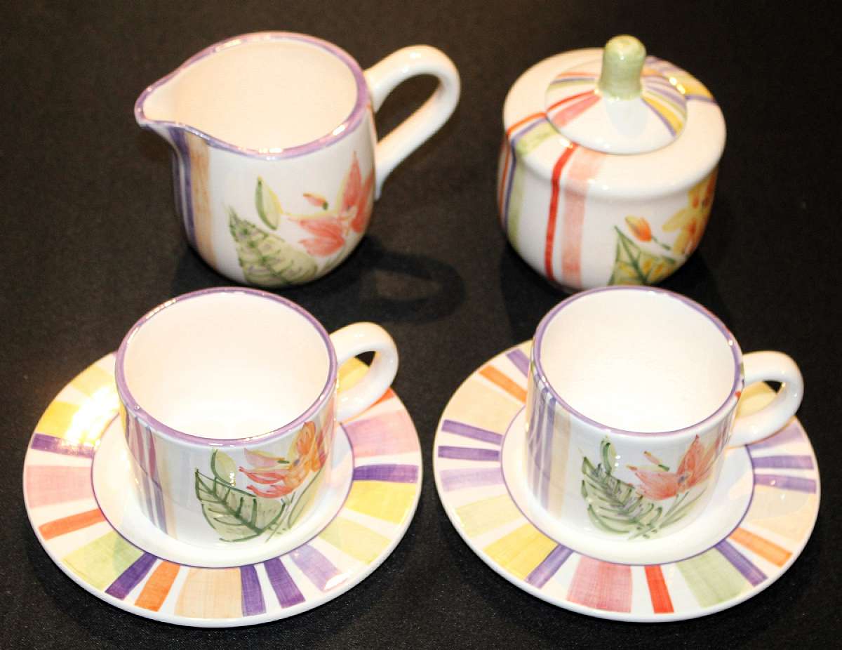 Up for sale are these Sango Maui Set Of Two Cup & Saucer Sets and One Creamer and Sugar Bowl in Excellent condition with no chips or cracks or Crazing, The Saucers measure approx. 6 3/8"W and the cups are 2 5/8"T by 3 3/8"W. Please see