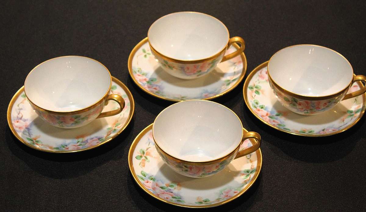 Up for sale is this Royal Bayreuth Antique Pink Rose Floral Set Of 4 Cups & Saucers in great condition with no chips, cracks or crazing. Minor Gold Wear. The saucers measure approx. 5 3/8"W and the cups 2"T by 3 5/8"W. This mark was used around 1902. Plea