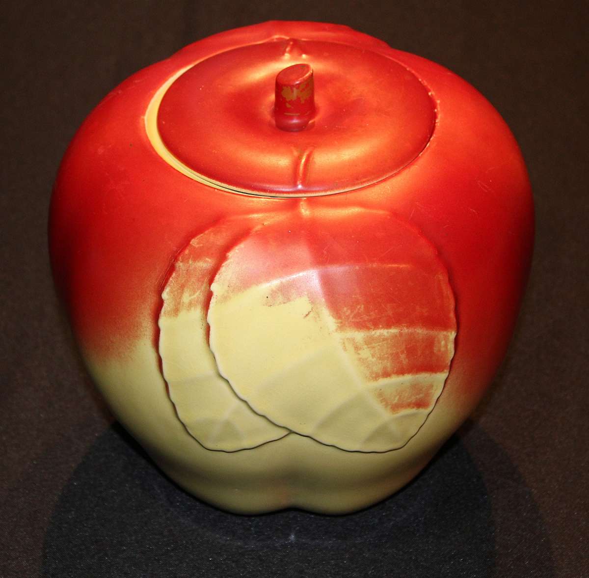 Up for sale is this Old Apple Design Covered Vintage Cookie Jar in great condition with no  cracks. Has a Small nick on inside rim of the container as well as some paint loss. It measures approx. 7 1/2" T  by  8 3/4" W. Nice Vintage pieceShippi