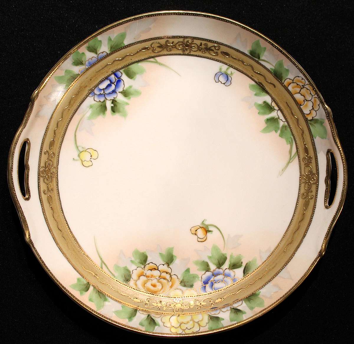 Up for sale is this Nippon Morimura Bros Handled Plate in excellent condition with no chips or cracks. Measures approx. 9 5/8"W. Shipping Excludes: Alaska/Hawaii, US Protectorates, APO/FPO, PO BoxShipping Provided to the United States Only.