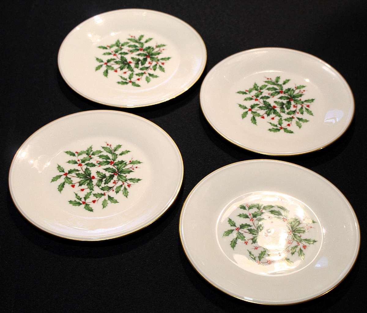 Up for sale are these Lenox Special USA Holiday Set Of Four Salad Plates With a Gold Rim in excellent condition with no chips or cracks. These measure approx. 8 1/8"W.  Shipping Excludes: Alaska/Hawaii, US Protectorates, APO/FPO, PO BoxShipping Pro