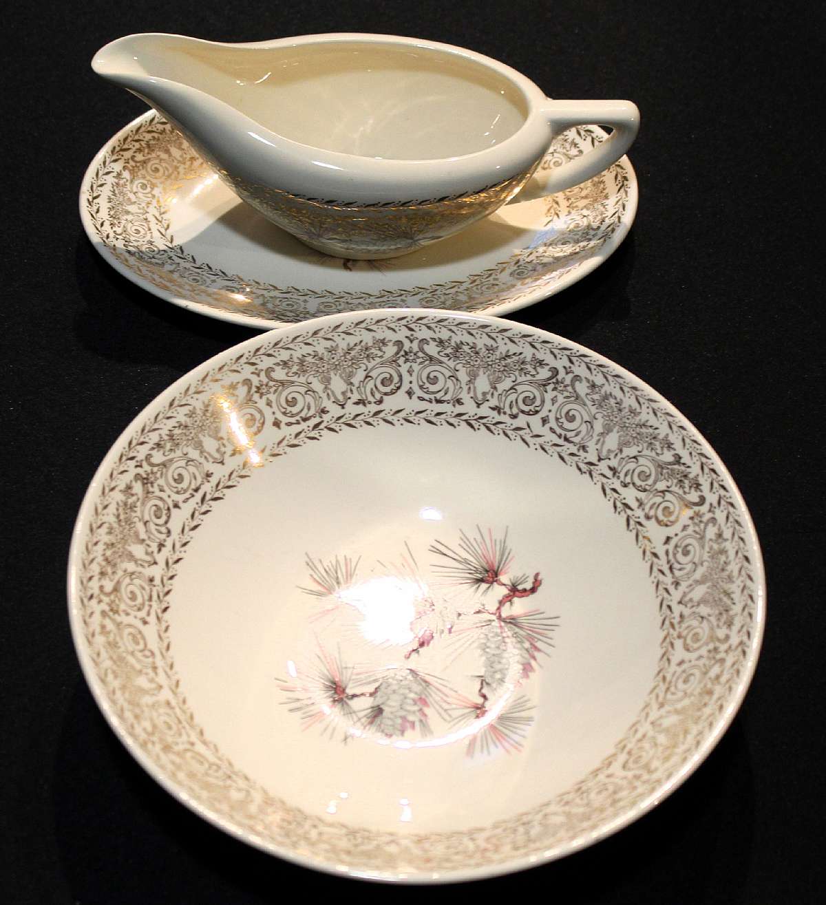 Up for sale is this Lifetime China Company Pine Cone Serving Bowl & Gravy Boat With Underplate In great condition with no chips or cracks or crazing. The bowl measures approx. 8 7/8" W by 2 1/4"T.  Shipping Excludes: Alaska/Hawaii, US Prote