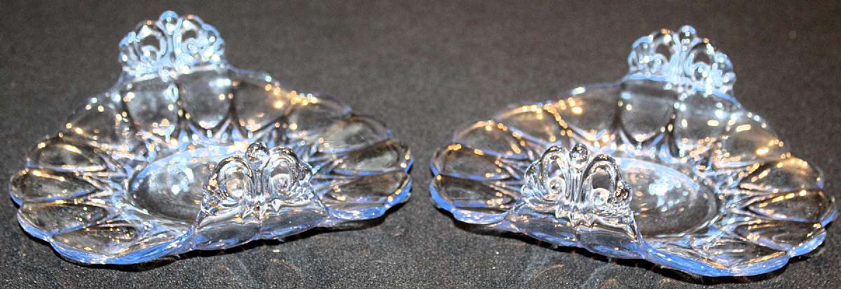 Up for sale are these New Martinsville Janice Bluer Vintage Pair Of Bon Bon Plates in great condition with no chips or cracks. They measure approx.  7"W.Shipping Excludes: Alaska/Hawaii, US Protectorates, APO/FPO, PO BoxShipping Provided to the Uni