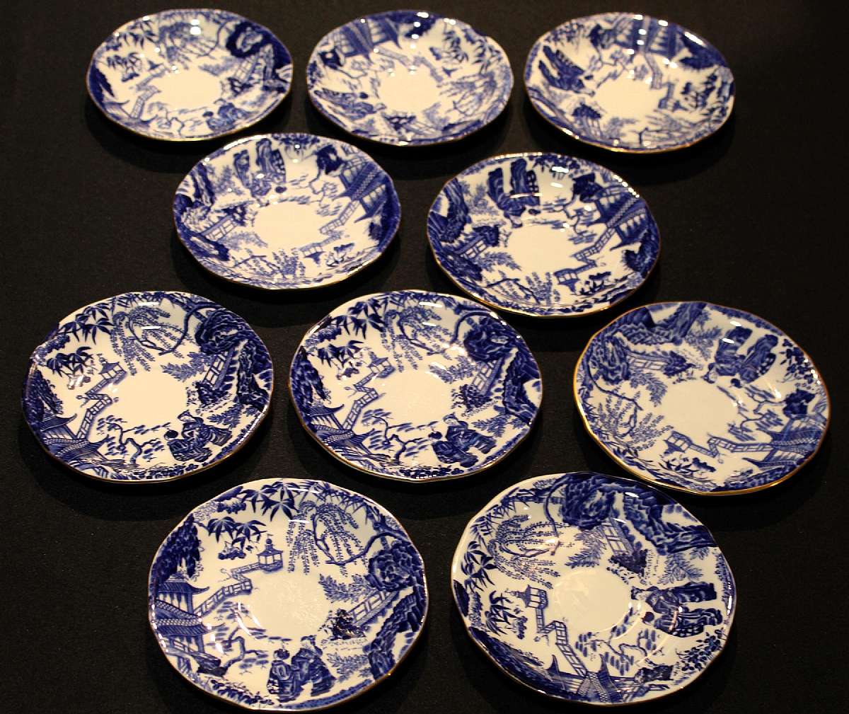 Up for sale are these Royal Crown Derby Blue Mikado Set Of Ten Saucers in great condition with no chips or cracks or crazing. They measure approx. 5 1/2"W to 5 3/4"W. Please see my other sales for more of this pattern.Shipping Excludes: Alaska/