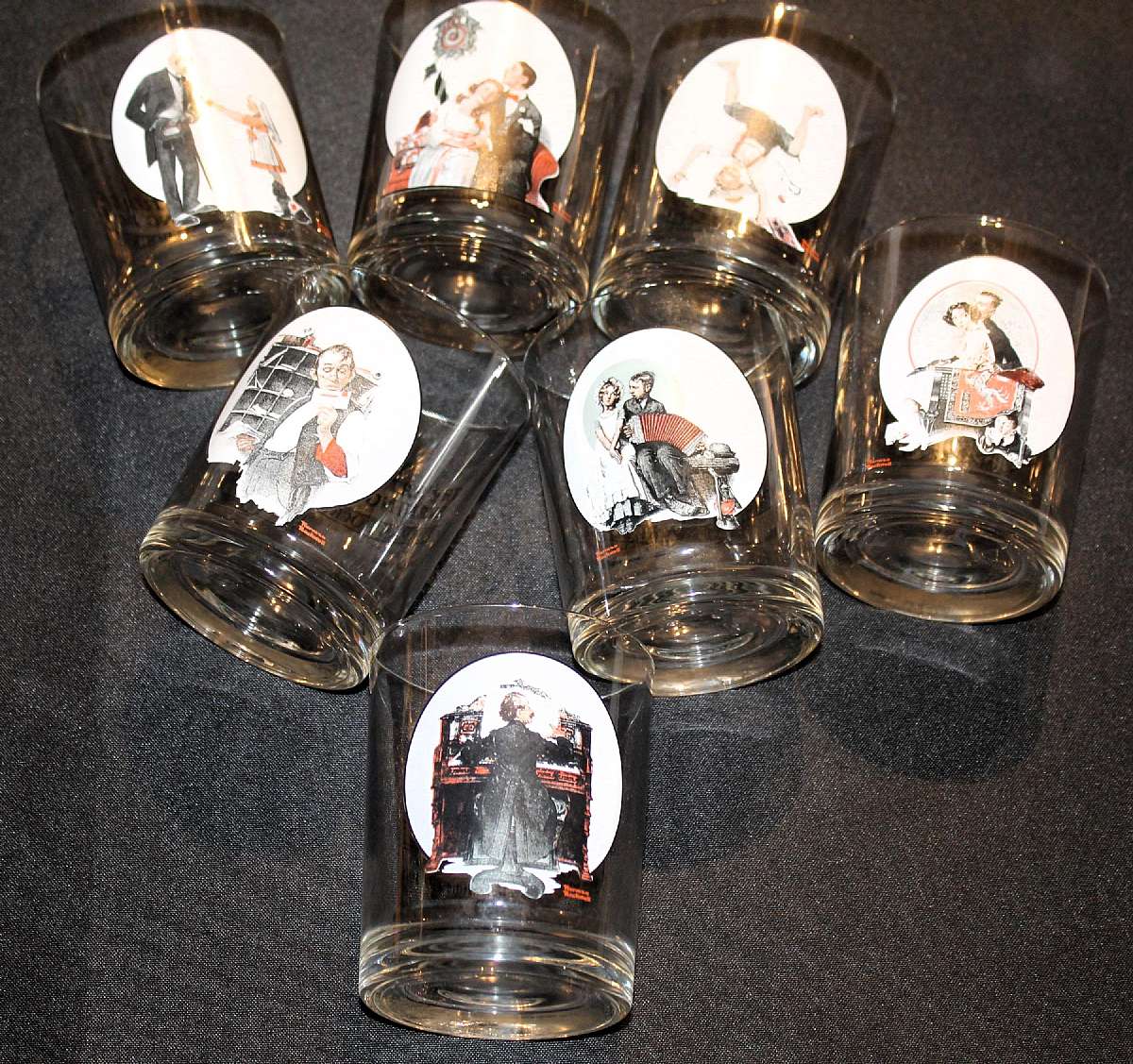 Up for sale are these Norman Rockwell Curtis Publishing Set Of Seven Old Fashion Glasses in excellent condition with no chips or cracks. The Glasses measure approx. 4 1/8"T by 3 3/8"W.  Shipping Excludes: Alaska/Hawaii, US Protectorates, APO/FP