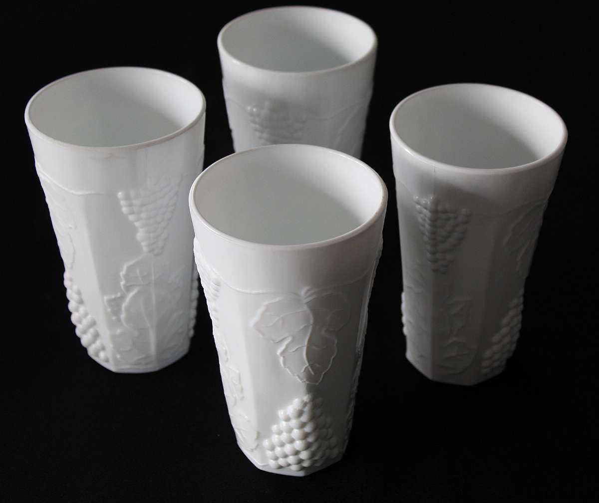 Up for sale are these Four Milk Glass Grape Design Tumblers in excellent condition with no chips or cracks. They measure approx. 5 3/4" Tall. Shipping Excludes: Alaska/Hawaii, US Protectorates, APO/FPO, PO BoxShipping Provided to the United States