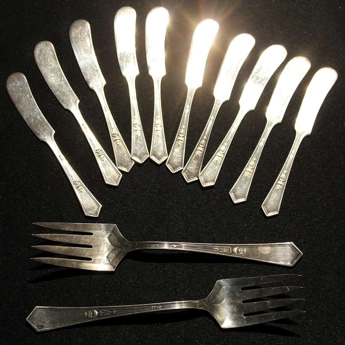Up for sale are these Rogers La Touraine Antique 12 Piece Flatware Set. Included are Ten Butter Spreaders and Two 8 1/4" Meat Forks. Everything we offer at auctions is pre - owned &/or used. This item(s) may show some signs of wear commensurate w