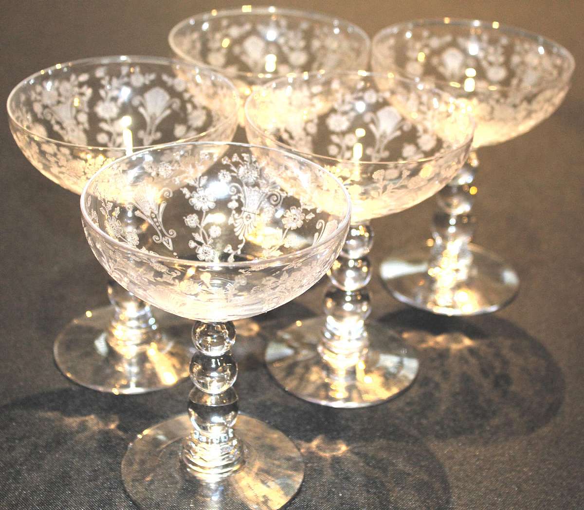 Up for sale are these Beautiful Duncan & Miller First Love Set Of Five Champagne/Tall Sherbet Glasses in excellent condition with no chips or cracks. The Glasses measure approx. 4 7/8"T by 3 3/4"W. Gorgeous Vintage Stemware. I have more sale