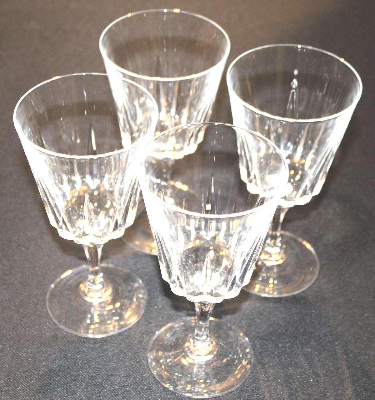 Up for sale are these Cristal Dâ€™Arques Durand Versailles Set Of Four Water Glasses in great condition with no chips or cracks. They measure approx. 6 5/8"T by 3 1/2"W.Shipping Excludes: Alaska/Hawaii, US Protectorates, APO/FP