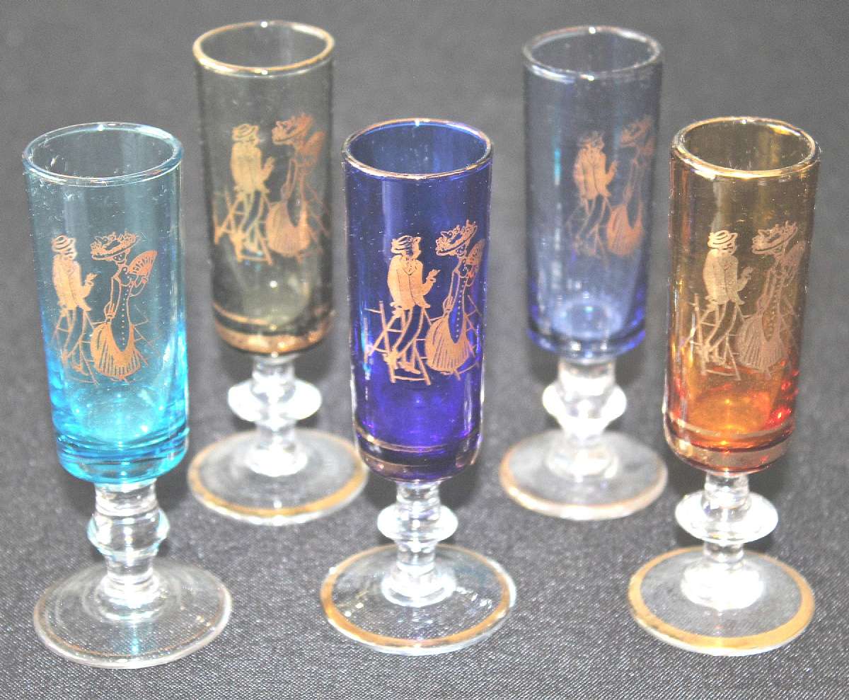 Up for sale are these Courting Scene Vintage Set Of Five Glasses. They measure approx. 4 1/2"T by 1 1/4"W.  There are no chips or cracks. There is some gold wear. Shipping Excludes: Alaska/Hawaii, US Protectorates, APO/FPO, PO BoxShipping Prov