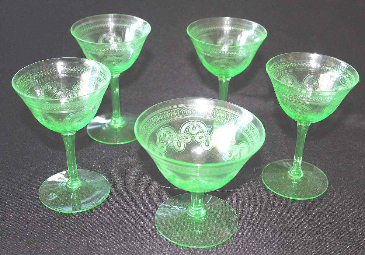 Up for sale are these Tiffin Franciscan Green 14196-11 Set Of 5 Depression Glass Stemware Pieces in excellent condition with no chips or cracks. Included are Four 4 1/4" T by 2 7/8" W glasses and One 3 1/2" T by 3 3/4" W glass.Shippin