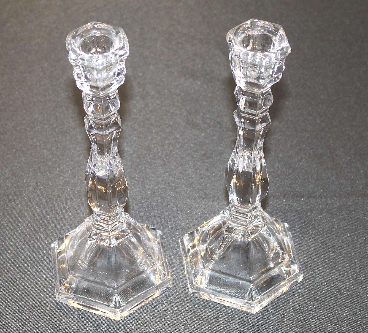 Up for sale are these Tiffany & Co Set Of Two Pillar Candlestick Holders in great condition. There are no cracks but one has a small flea bite on the base which the last picture shows. They measure approx. 9 1/4"T.Shipping Excludes: Alaska/Hawai