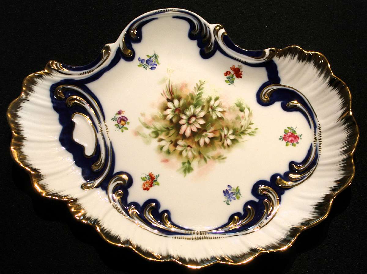 Up for sale is this Limoges Stunning Beautiful Decorated Hand Painted Plate in excellent condition with no chips or cracks. Measures approx. 12" by 9 1/4"Shipping Excludes: Alaska/Hawaii, US Protectorates, APO/FPO, PO BoxShipping Provided to t
