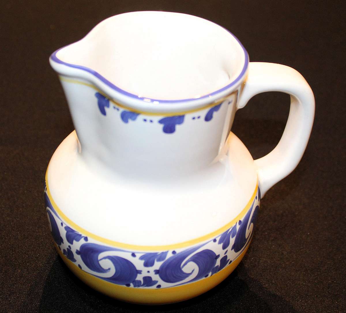 Up for sale is this Herend Village Splash Pitcher. It measures approx. 6 1/4"T and holds 32 ounces. It is in excellent condition with no chips or cracks.  Shipping Excludes: Alaska/Hawaii, US Protectorates, APO/FPO, PO BoxShipping Provided to the U