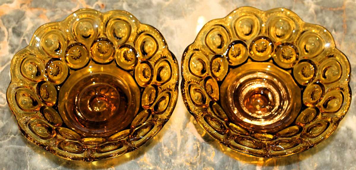 Up for sale are these Smith Moon & Stars Amber Set Of 2 Candle Bowls in great condition. The Two Candle Bowls have no chips or cracks and measure approx. 7 3/4"W.  Shipping Excludes: Alaska/Hawaii, US Protectorates, APO/FPO, PO BoxShipping Prov
