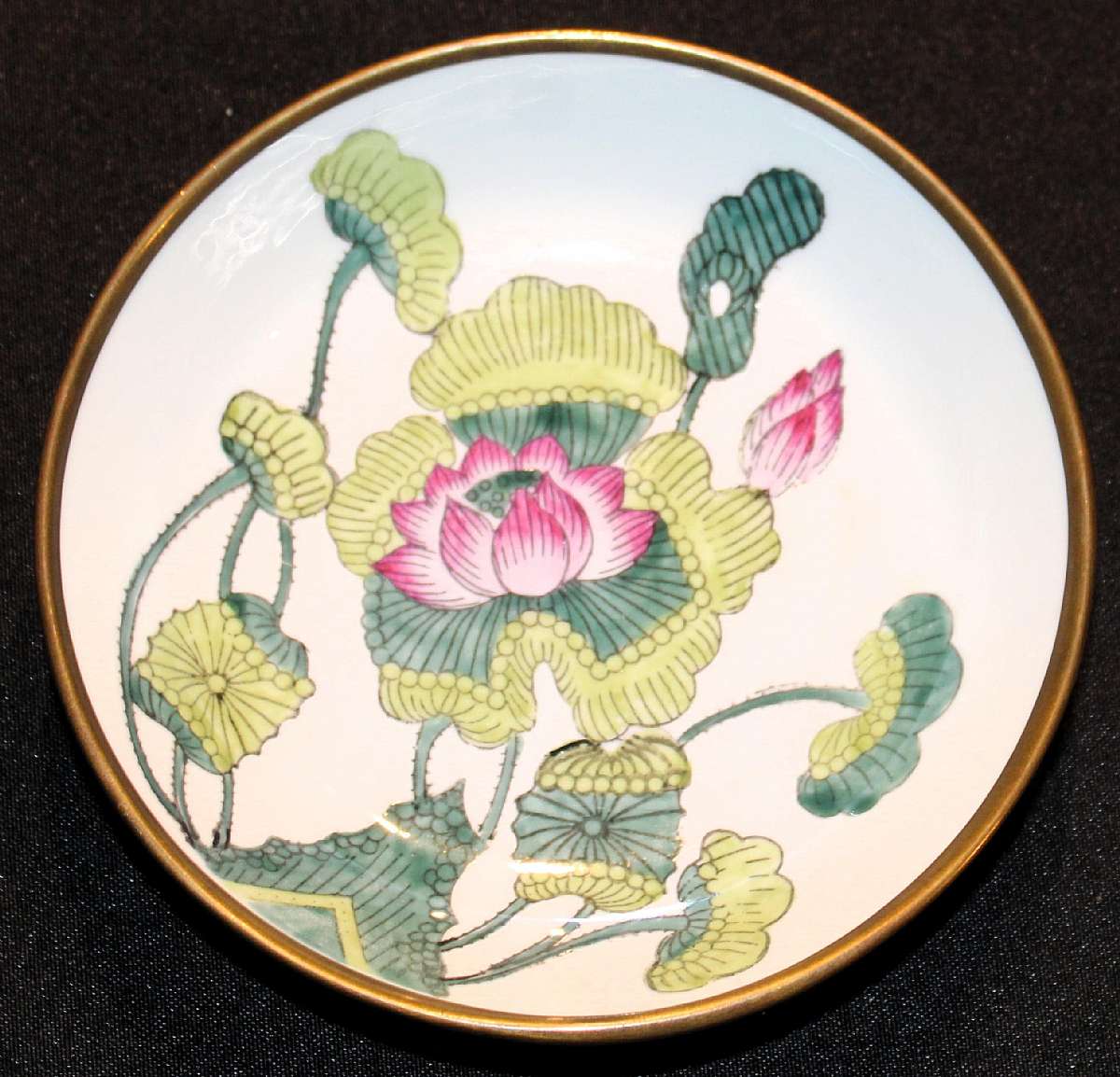 Up for sale is this Chinese Porcelain Ware Decorative Bowl. Base is metal. Measures approx. 5 7/8"W by 1 1/2"D.  Shipping Excludes: Alaska/Hawaii, US Protectorates, APO/FPO, PO BoxShipping Provided to the United States Only.
