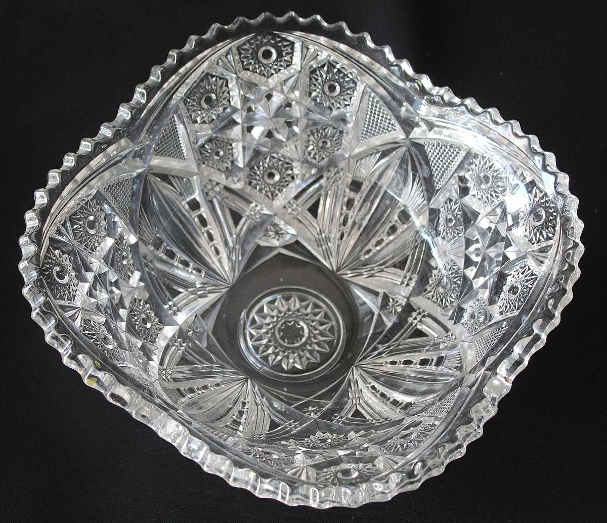 Up for sale is this Beautiful Antique Glass Saw Tooth Rim Heavily Decorated Bowl. Measures approx. 10 1/2" wide by 4 3/4"T. This does have a couple of flee bites and manufacturers Defects. Beautiful piece. Sharp to the touch. Shipping Excludes: