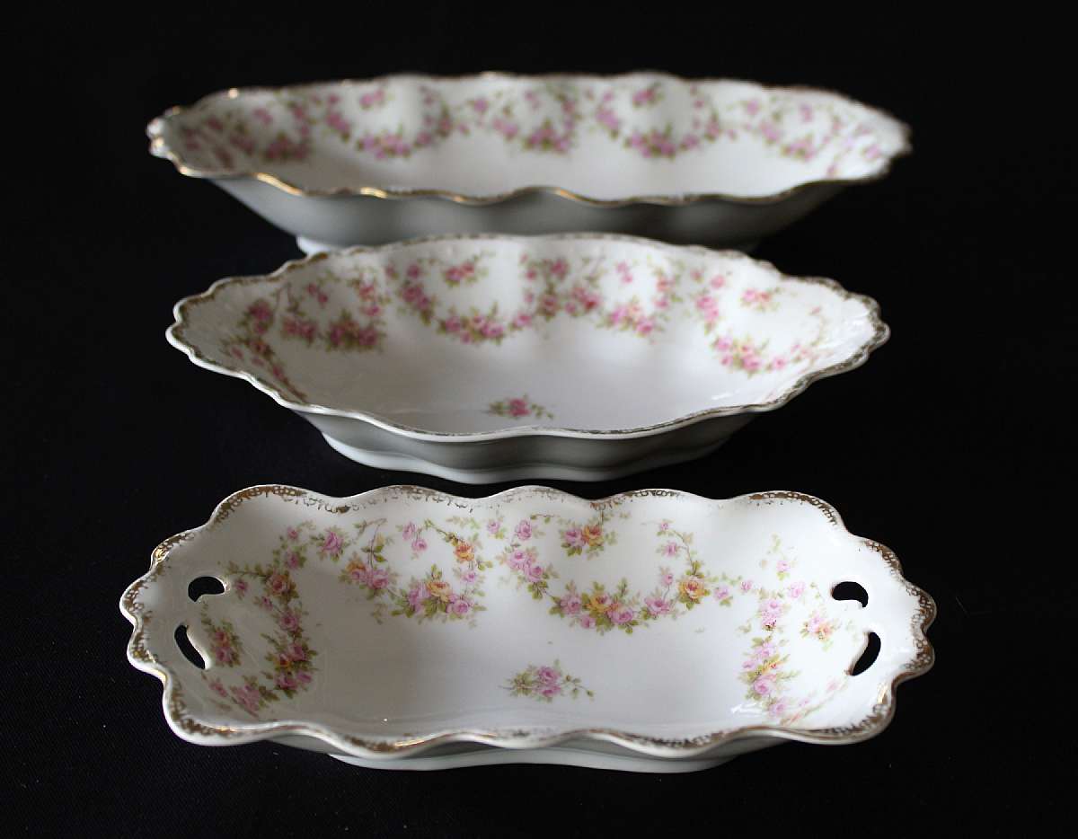 Up for sale are these Altrohlou Bridal Rose Set Of Three Serving Dishes in great condition with little on the design. Included is one 8" by 4" Serving Piece with no chips or cracks, One 8 7/8" by 5 1/8" Serving Piece with no chips or cracks and one 11 5/8