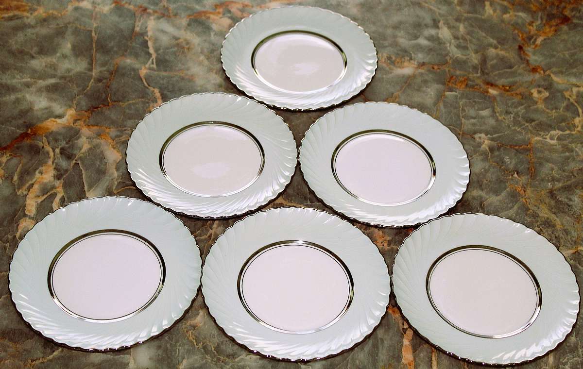 Up for sale are these Rare Royal Tettau South Wind Grey Green Set Of Six Bread Plates in excellent condition with no chips or cracks. They measure approx. 6 3/8"W.  Please see my other sales for more of this beautiful pattern.Shipping Excludes: Alas