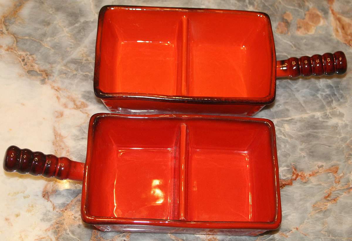 Up for sale are these Metlox Poppytrail Red Rooster Red Set Of Two Rectangular Divided Vegetable Bowls in excellent condition with no chips or cracks. They measure approx. 8 1/2"L not measuring the handle by 5 1/2"W.Shipping Excludes: Alaska/Ha