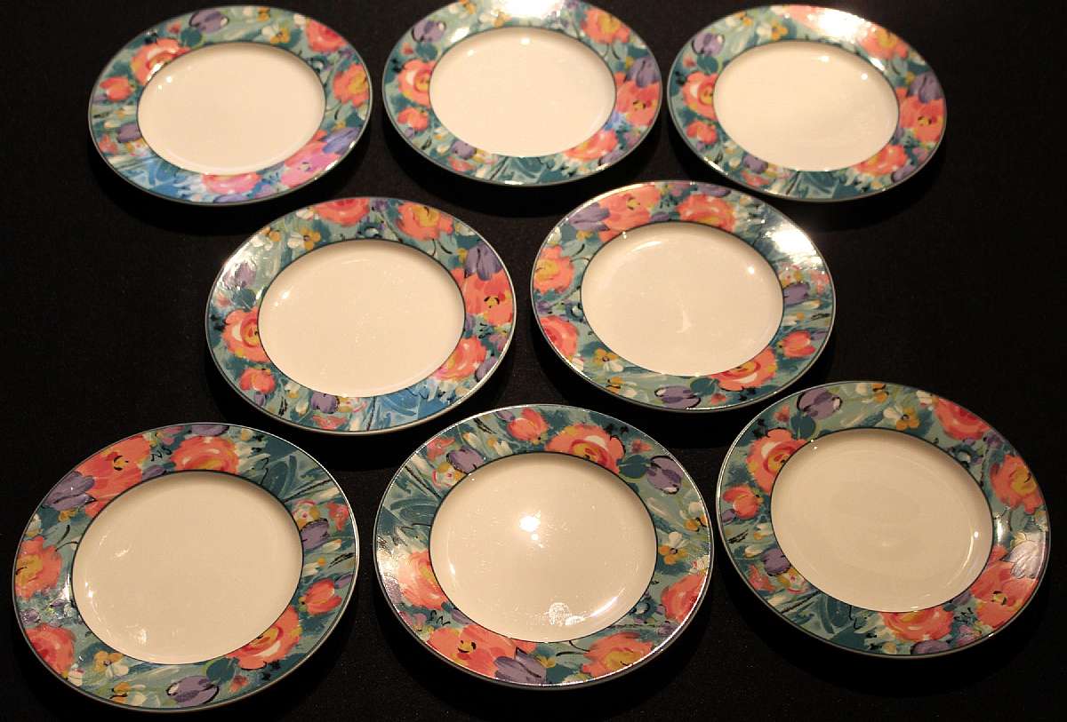 Up for sale are these Mikasa Love Bloom Set Of Eight Dessert Plates in great condition with no chips or cracks. The Plates measure approx. 6 1/2"W.  Shipping Excludes: Alaska/Hawaii, US Protectorates, APO/FPO, PO BoxShipping Provided to the United