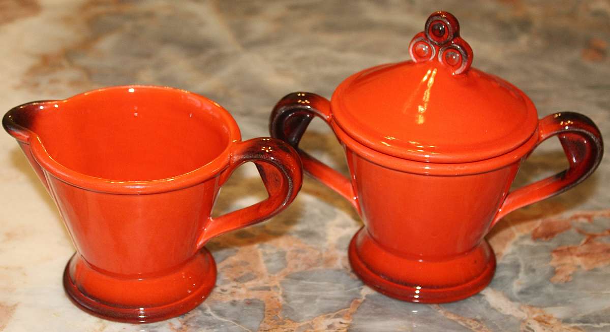 Up for sale is this Metlox Poppytrail Red Rooster Red Sugar Bowl & Creamer in great condition with no chips or cracks. The creamer measures approx. 3 3/8"T and the sugar bowl is 5 1/2"T.Shipping Excludes: Alaska/Hawaii, US Protectorates, AP