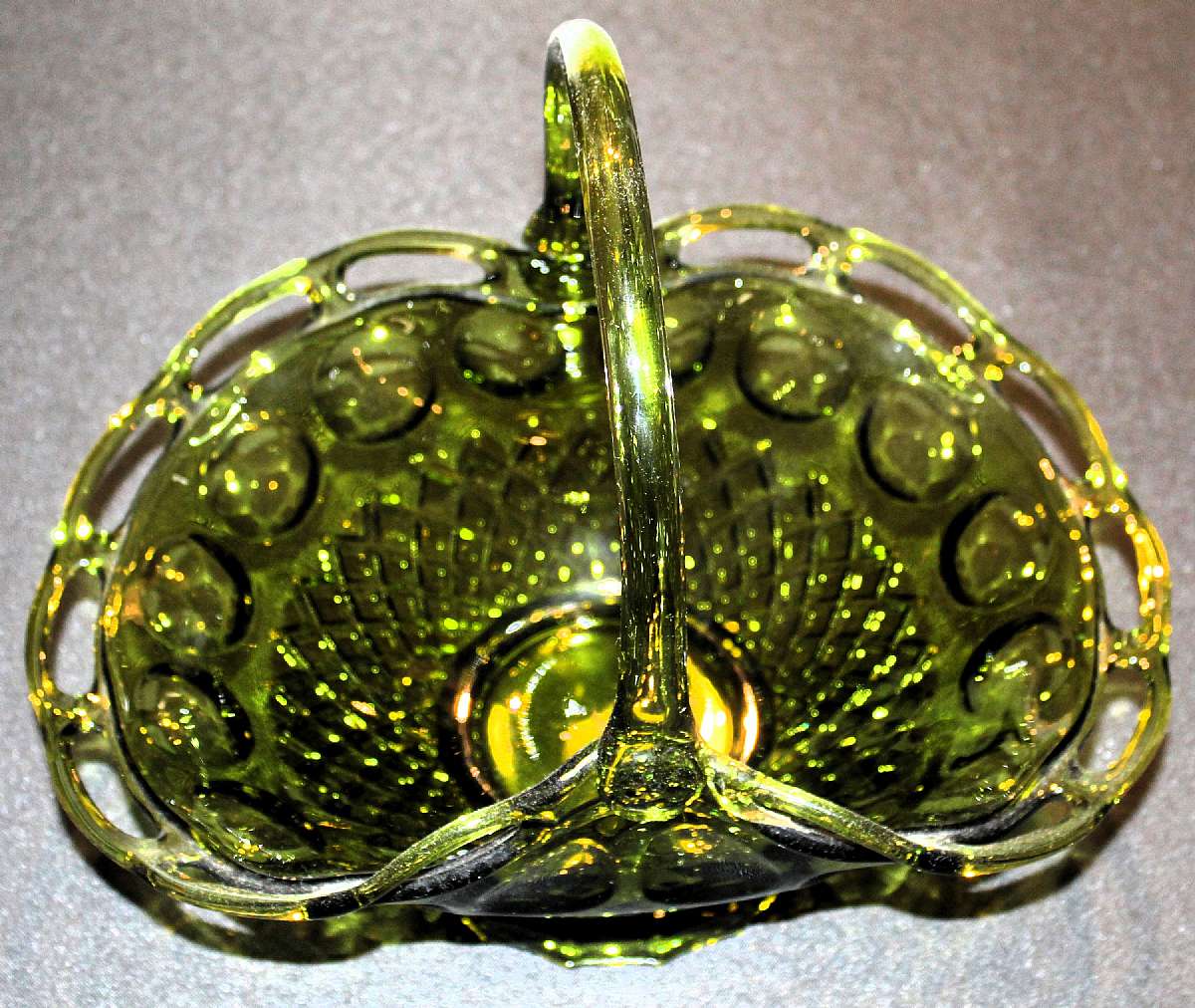 Up for sale is this Large Glass Handled Footed Laced Edged Scalloped Basket in excellent condition with no chips or cracks. The basket measures approx. 12 1/4"L by 8"W by 11"T.Shipping Excludes: Alaska/Hawaii, US Protectorates, APO/FPO, PO