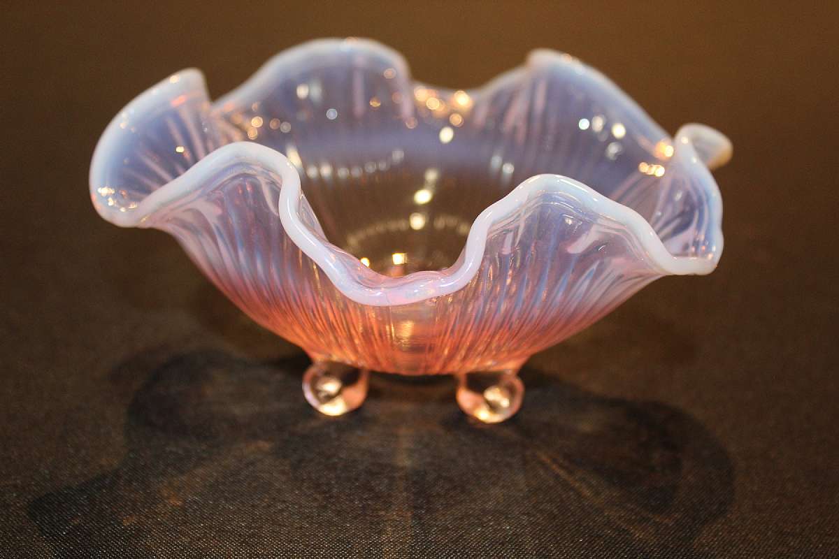 Up for sale is this Lilac Opalescent Three Footed Bowl in great condition with no chips or cracks. Measures approx.  6 3/8" W by 3 1/8"T. Nice Piece. Shipping Excludes: Alaska/Hawaii, US Protectorates, APO/FPO, PO Box Shipping Provided to the