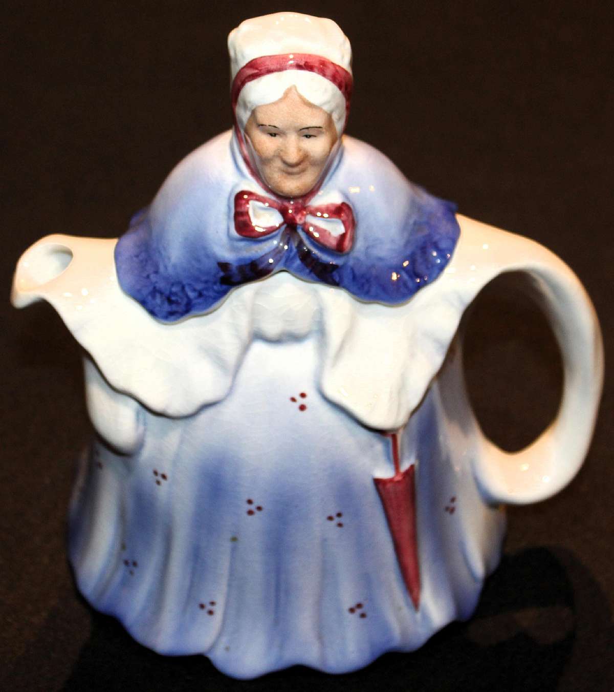 Up for sale is this vintage H J Wood Little Old Lady Tea Pot & Lid in good condition with no chips. There is crazing. Measures about 8 inches tall without the lid.Shipping Excludes: Alaska/Hawaii, US Protectorates, APO/FPO, PO BoxShipping Provided t