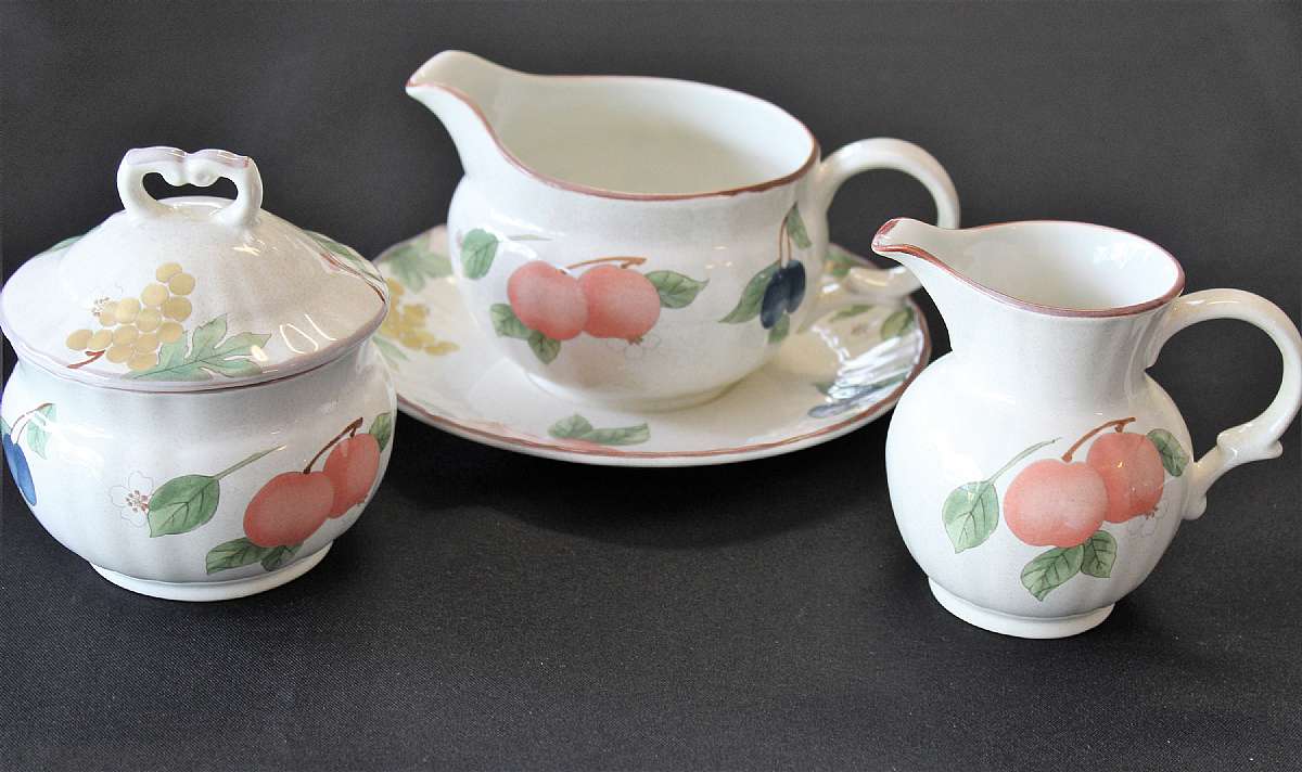 Up for sale are these Mikasa Fruit Panorama Creamer & Sugar Bowl and Gravy Boat With Under Plate in great condition with no chips or cracks. The Sugar bowl measures approx. 3"T, the creamer is 4 1/4"T.  Shipping Excludes: Alaska/Hawaii, US
