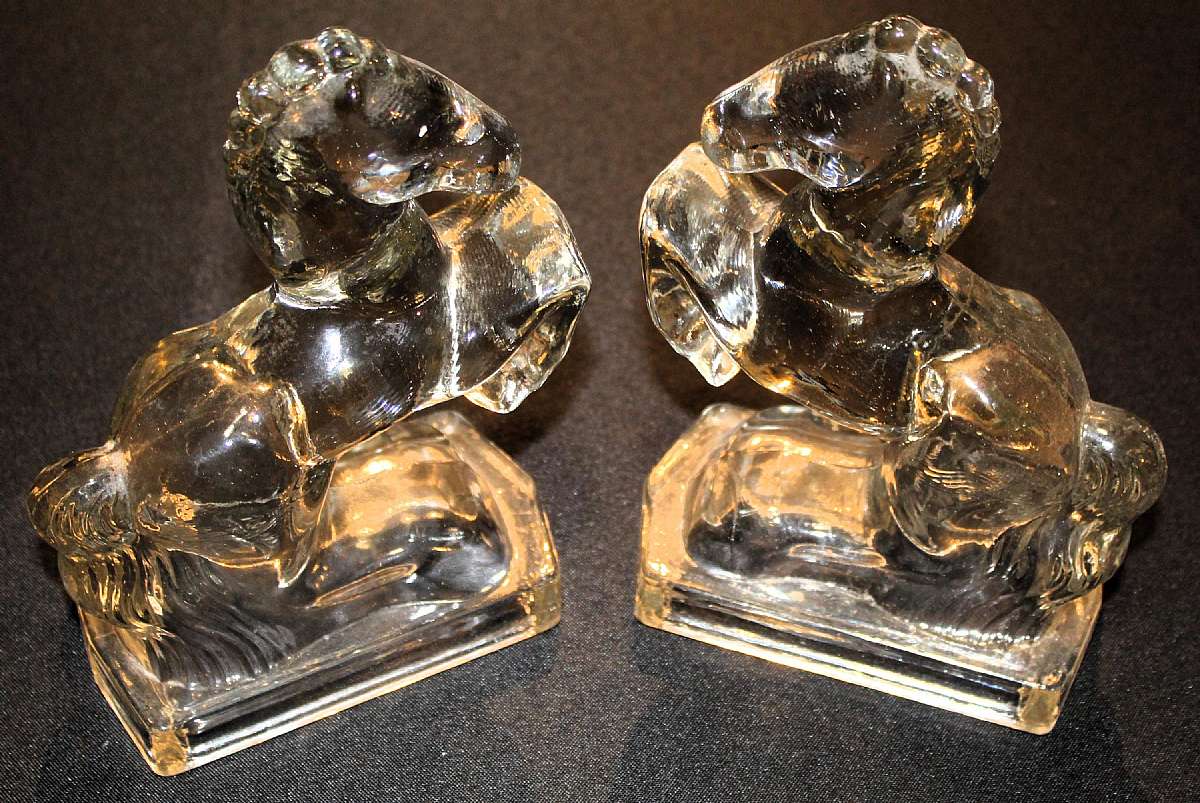 Up for sale are these Glass Pair of Rearing Horse Bookends in great condition with no chips or cracks. They measure approx. 7 7/8"T by 5 1/4"W. Shipping Excludes: Alaska/Hawaii, US Protectorates, APO/FPO, PO BoxShipping Provided to the United